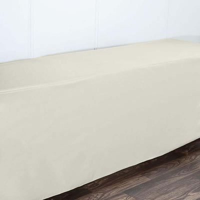 Beige table cover on a wooden surface.