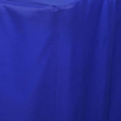 Blue fabric draped elegantly on a surface for styling purposes.