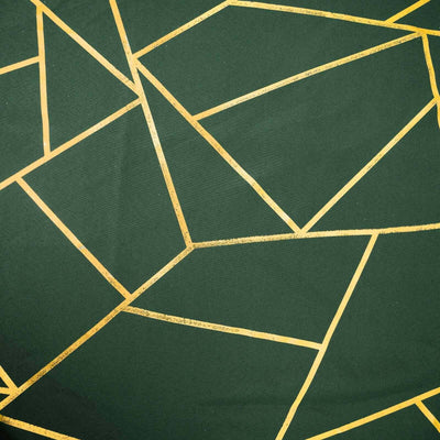 Green fabric with gold geometric patterns.
