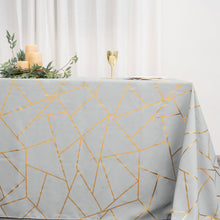 90 Inch x 156 Inch Rectangle Tablecloth In Silver With Gold Foil Geometric Design
