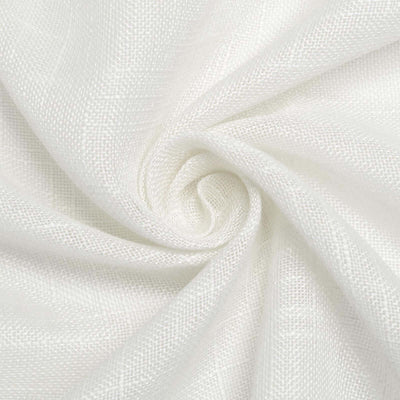 White textured fabric close-up showing soft, delicate weave details.
