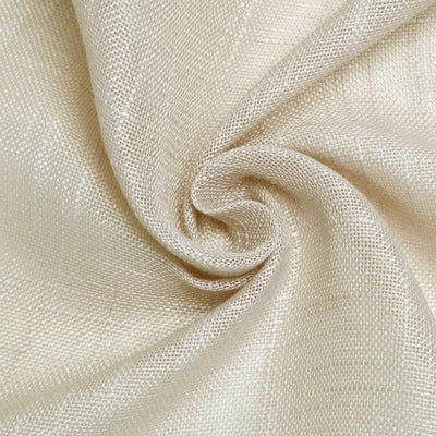 Textured beige fabric in a swirl pattern.
