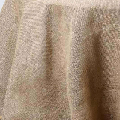 Textured beige fabric draped elegantly, showcasing its natural fibers.