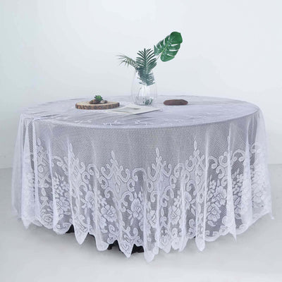 Round lace tablecloth with elegant floral design on a plain white backdrop