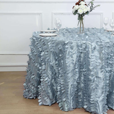 Light blue tablecloth with leaf design, perfect for elegant dining setups.