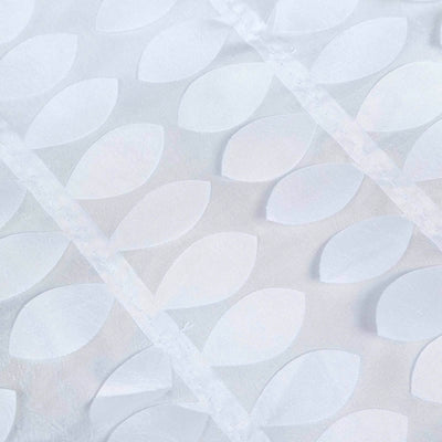 Textured white fabric with leaf patterns for home decor.