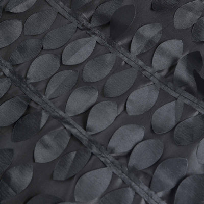 Black fabric with textured leaf pattern for elegant decor.