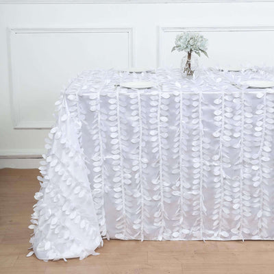 White tablecloth with leaf design, perfect for elegant table settings.