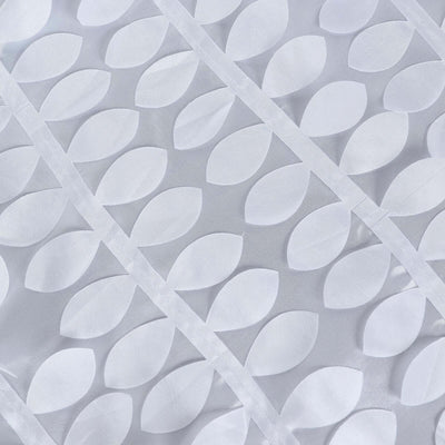 White fabric with a leaf pattern design.