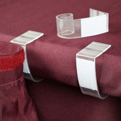 Clear fabric clips for securing tablecloths on surfaces