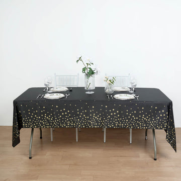 Add Cosmic Charm to Your Event with Black Gold Stars Sprinkled Plastic Tablecloth