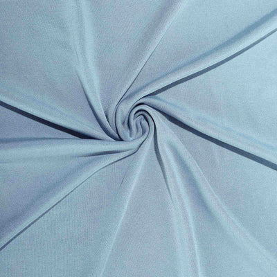 Light blue fabric with a soft texture arranged in a spiral pattern.