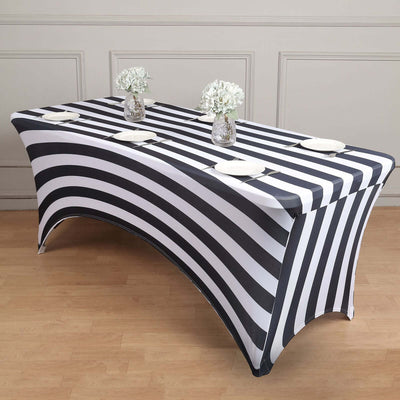Black and white striped table cover for events and parties.