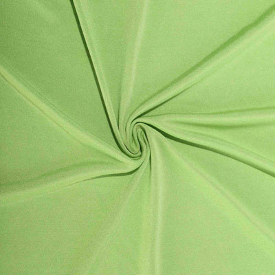 Light green fabric texture in a spiral pattern.