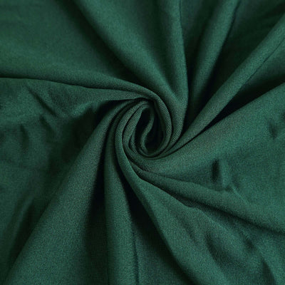 Dark green fabric texture in a spiral arrangement.