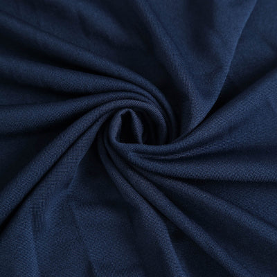 Navy blue fabric texture in a swirling pattern.