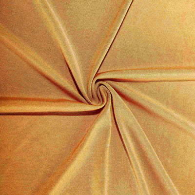 Soft golden fabric texture with draped folds.