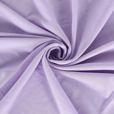 Purple fabric draped in a swirl pattern showcasing its texture.