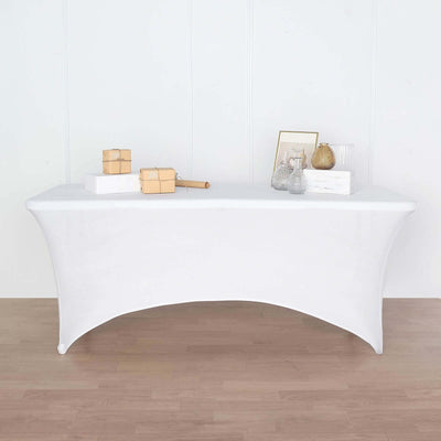 White stretch table cover for event decoration and styling.