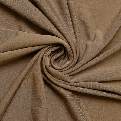 Brown textured fabric in a spiral arrangement.