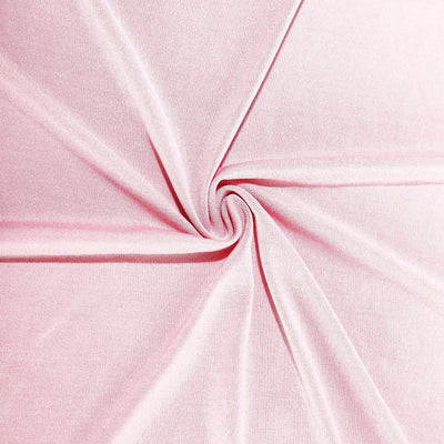 Soft pink fabric texture in a swirling pattern.