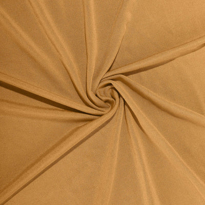 Textured mustard fabric in a spiral pattern.