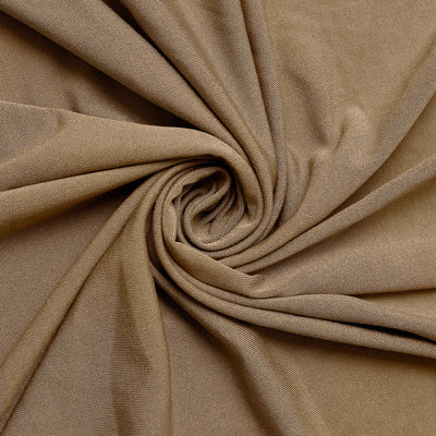 Brown textured fabric in a swirling pattern.
