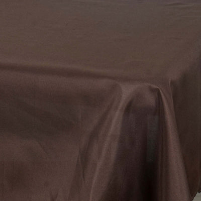 Brown tablecloth fabric draped on a surface.