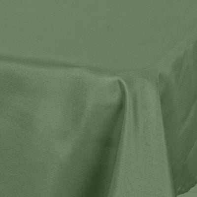 Green satin tablecloth draped elegantly on a surface.