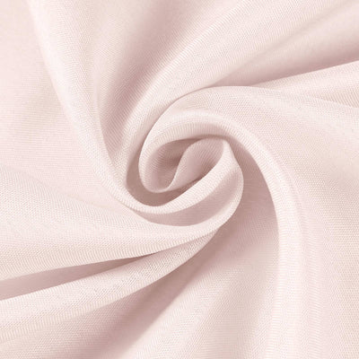 Light pink fabric swirl showcasing soft texture and drape.