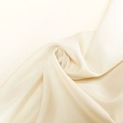 Cream-colored satin fabric draped elegantly.