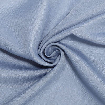 Light blue fabric with a soft texture, spiraled for visual interest.