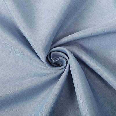 Light blue textured fabric swirl, showcasing its smooth surface and soft drape.