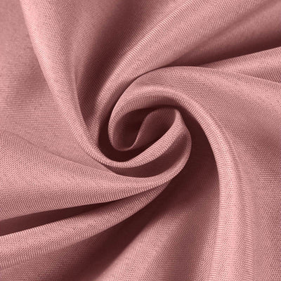 Textured pink fabric close-up, showcasing its soft and smooth surface.