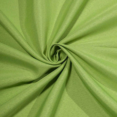 Green fabric texture with a smooth finish, showcasing swirling folds.