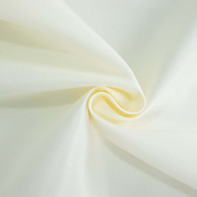 Soft yellow fabric showing smooth texture and drape.