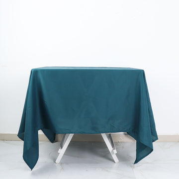 Add Elegance to Your Event with the Peacock Teal Seamless Polyester Square Tablecloth