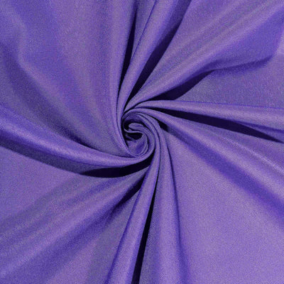 Purple fabric swirling in a spiral pattern.