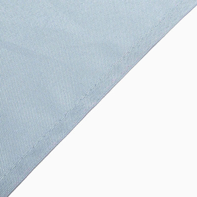 Light blue fabric texture with a clean edge detail.
