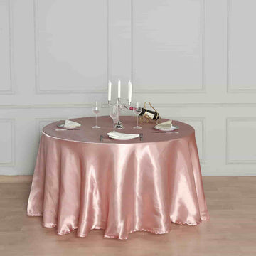 Create an Elegant Atmosphere with the Dusty Rose Seamless Satin Round Tablecloth 108