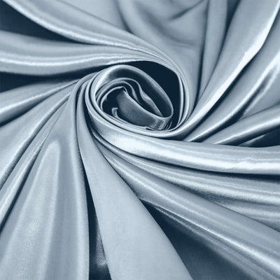 Soft blue satin fabric in a spiral pattern.