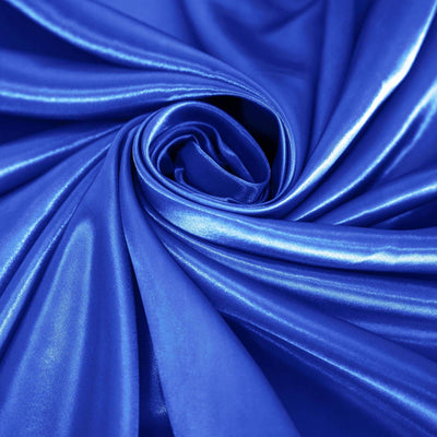 Glossy royal blue fabric in a swirling pattern.