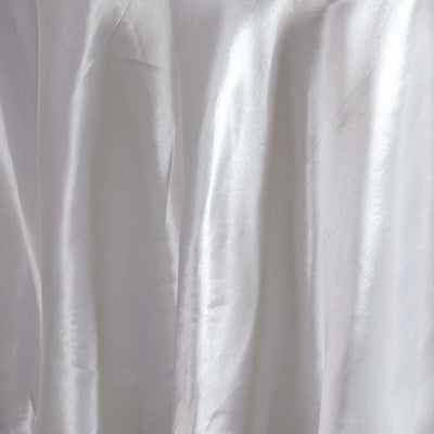 Silky white fabric with soft folds and sheen