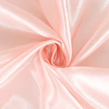Create a Memorable Event with the Blush Seamless Satin Round Tablecloth 132