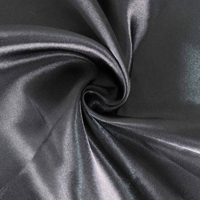 Black satin fabric with a smooth, shiny texture.