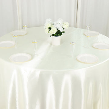 Dress Your Tables in Ivory Elegance with our Seamless Satin Tablecloth