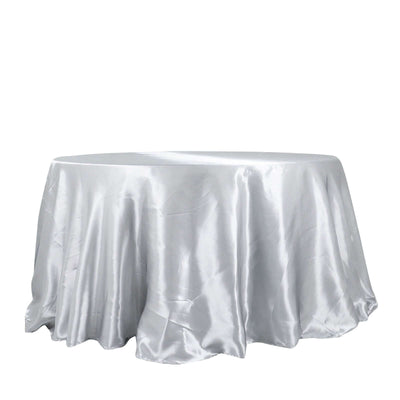 Silver satin tablecloth with elegant draping
