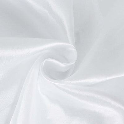 Smooth white fabric texture swirl close-up shot.
