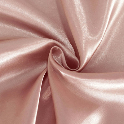 Soft pink satin fabric with a smooth, shiny texture.
