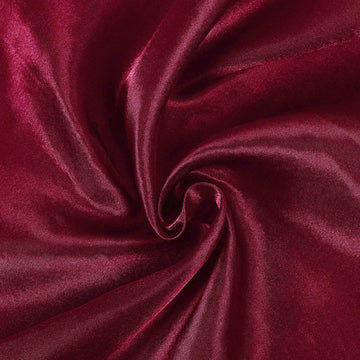 Create a Festive Atmosphere with the Burgundy Round Tablecloth